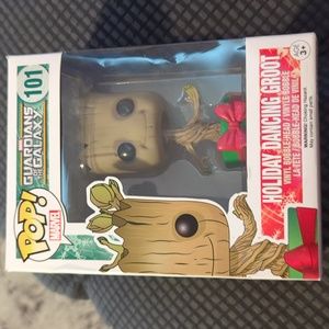 Holiday dancing Groot pop figure. 101